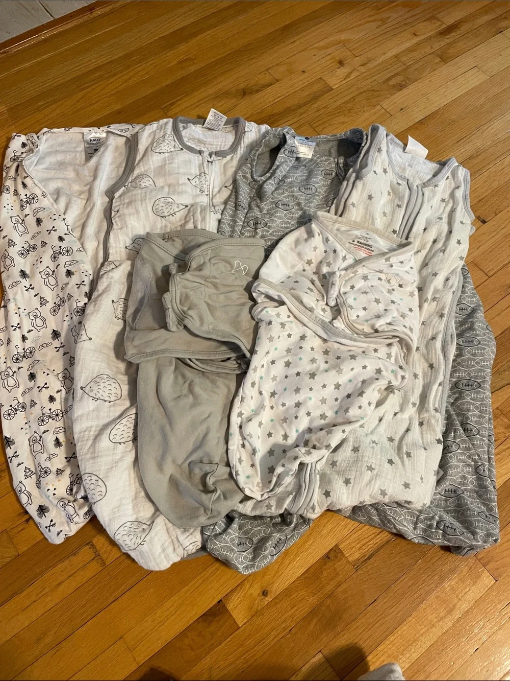 Assorted sizes of halo and swaddle me Kids Pajama Sleep Sack Set